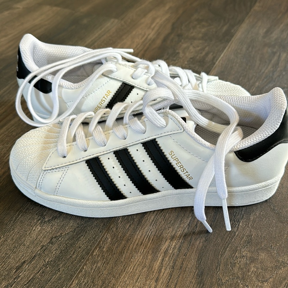 Adidas. Kids size 5/womens 7